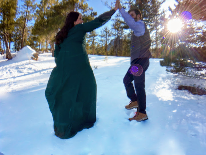A man and woman learn how to elope in Rocky Mountain National Park by marrying in the snow-capped mountains.