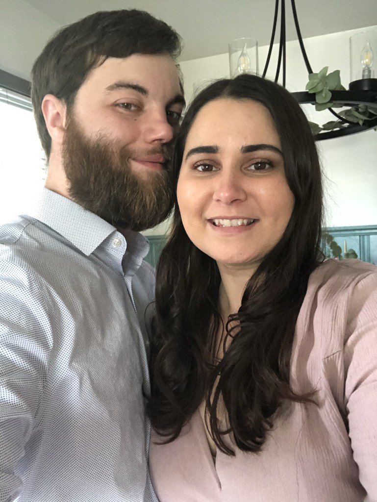 Two lovers posing at their elopement party.