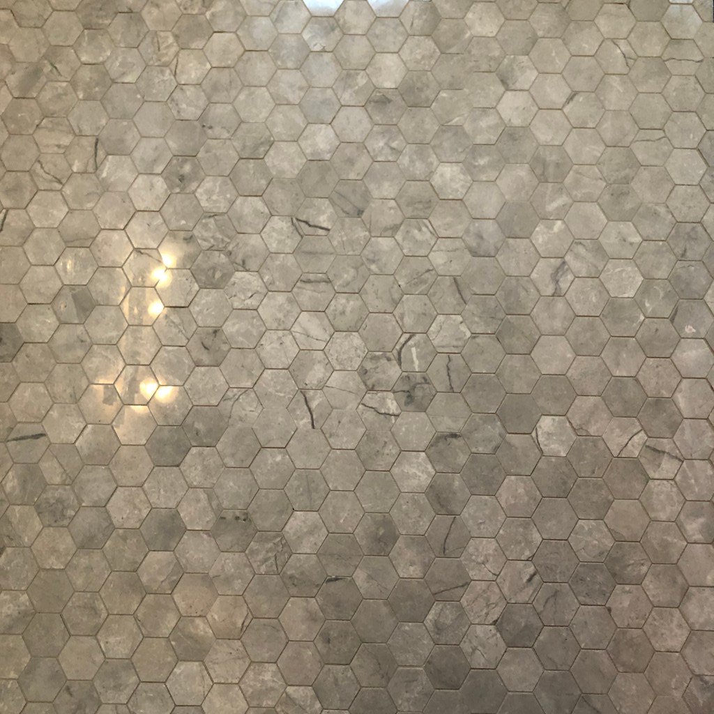 How to lay hexagonal floor tiles is not terribly hard to do. Here is the finished and cleaned floor.