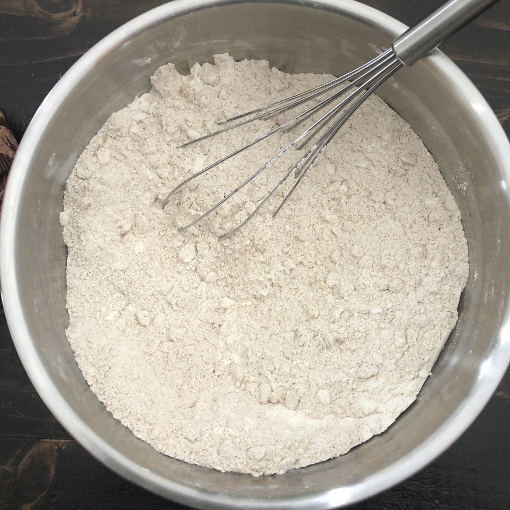 Dry ingredients sit in a bowl, just waiting to be mixed.