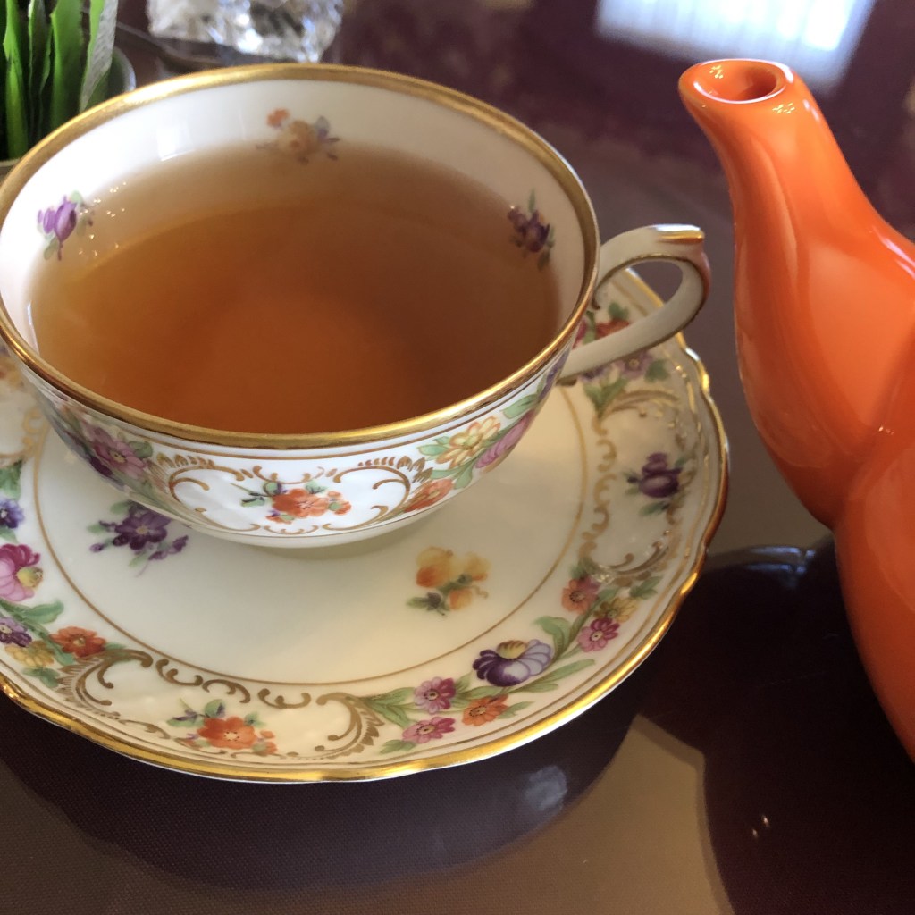 Tea sits in a beautiful teacup on a table in Caledonia, Missouri.
