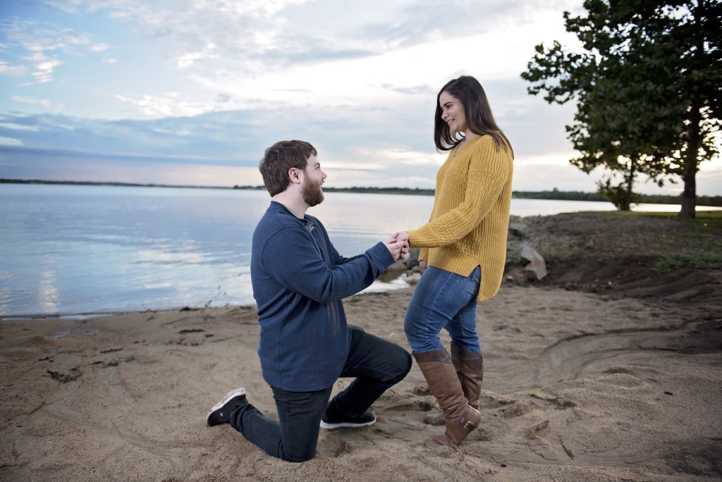 A man and woman pose as their engagement story develops and unfolds.