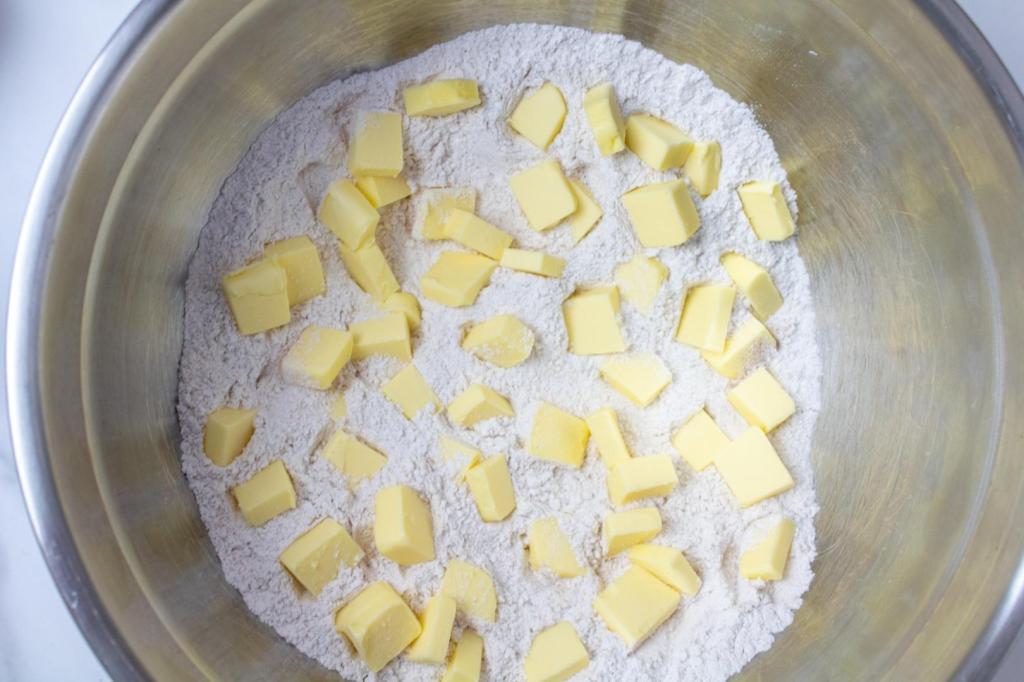 Butter chunks are added to a dry mixture.