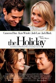 A poster of a film is shown of the holiday where two couples smile at one another.