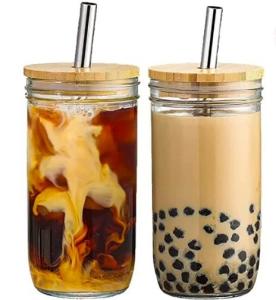 Glass with bamboo lids have straws in them.