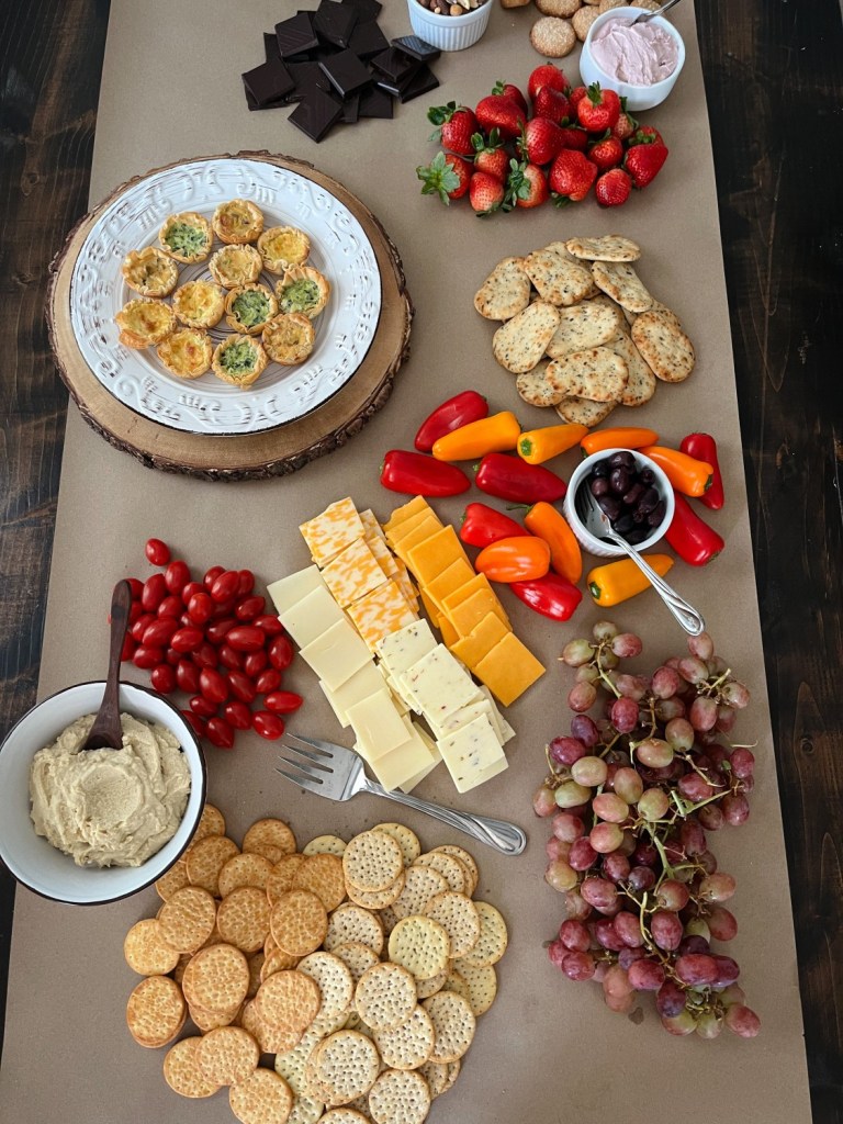 A gorgeous, vibrant vegetarian charcuterie spread is made to dine on during the mother blessing.