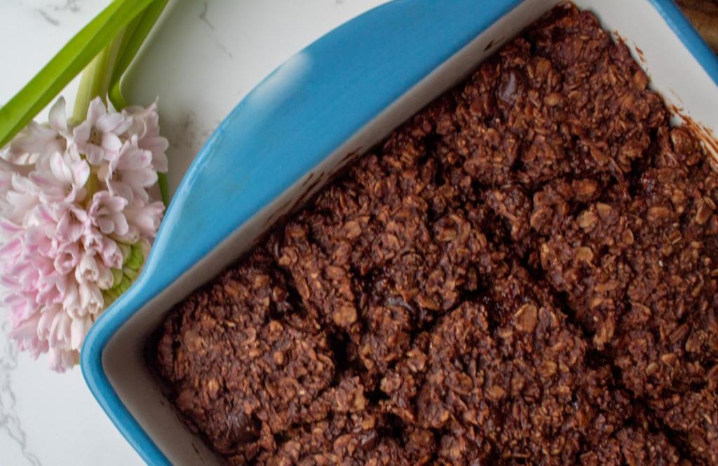 Chocolate Baked Oats have flowers next to them.
