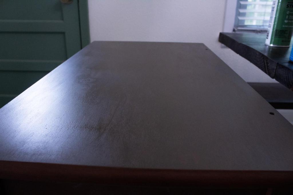 A table has just been refinished and is spot free.