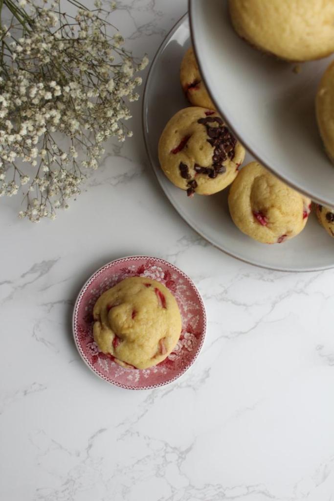 A bird's eye view of an easy muffin recipe with strawberries added in.