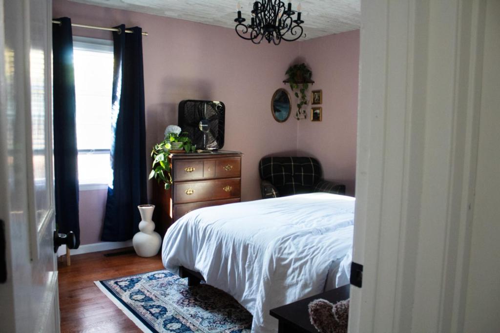 A cottagecore master bedroom is revealed after months of slowly decorating.