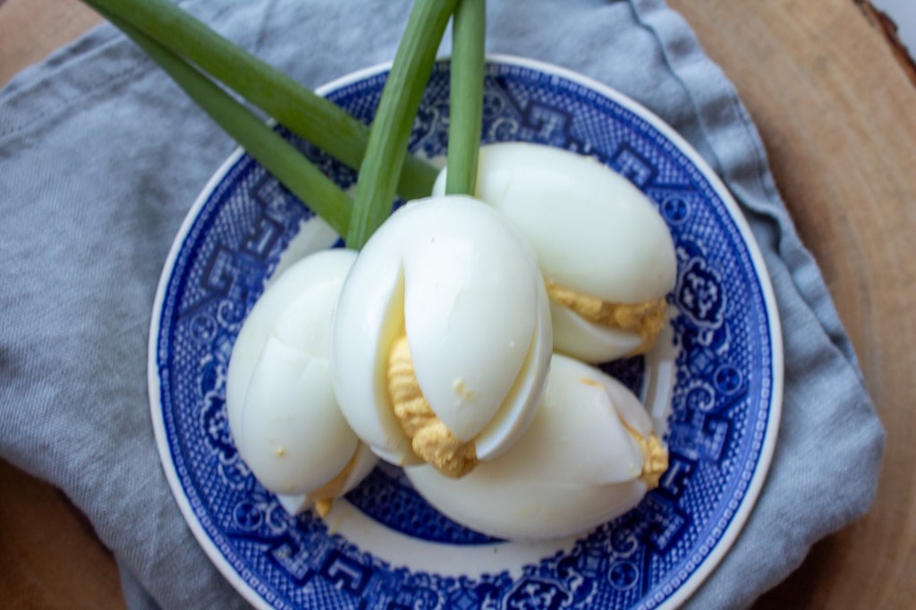 Deviled eggs have green onions added to look like tulips.