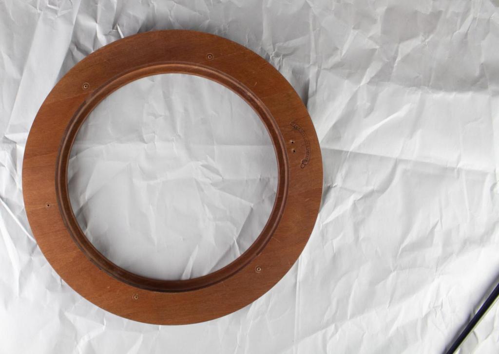 A wooden frame has all its parts removed from it.