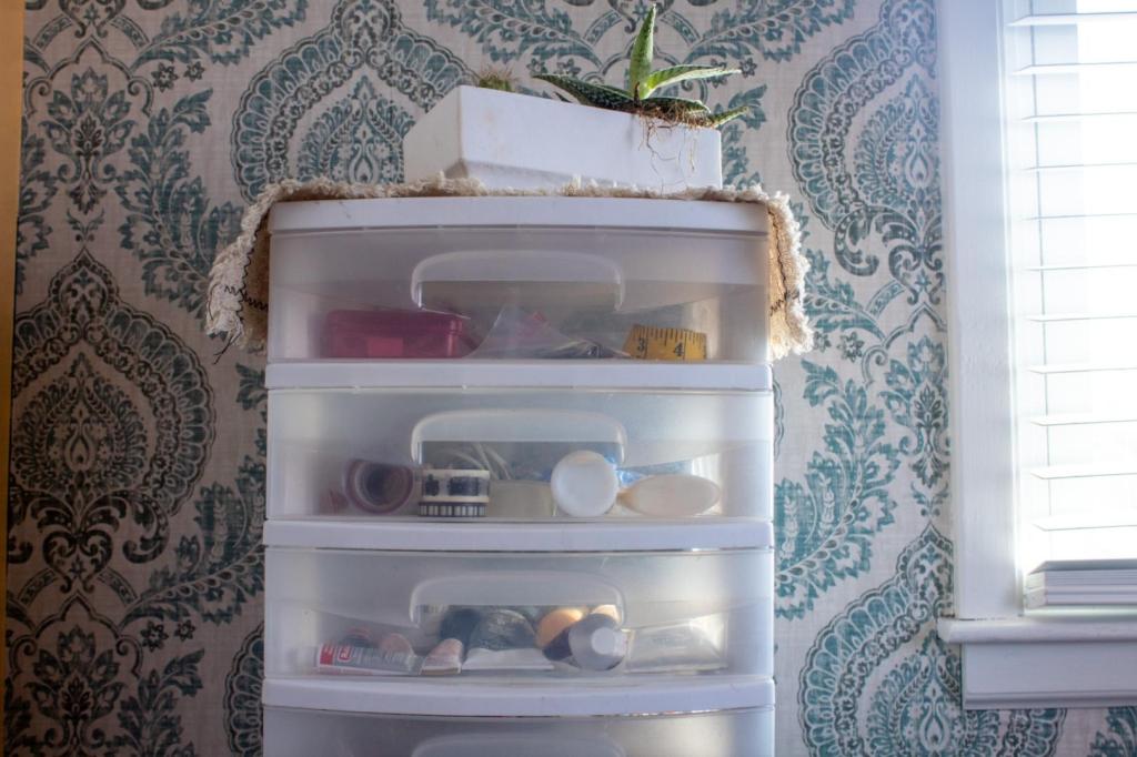 Craft drawers are organized in an office.