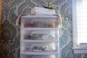 Craft drawers are organized in an office.