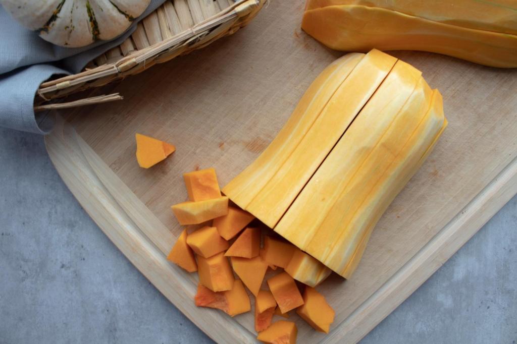 Squash is cubed into pieces.