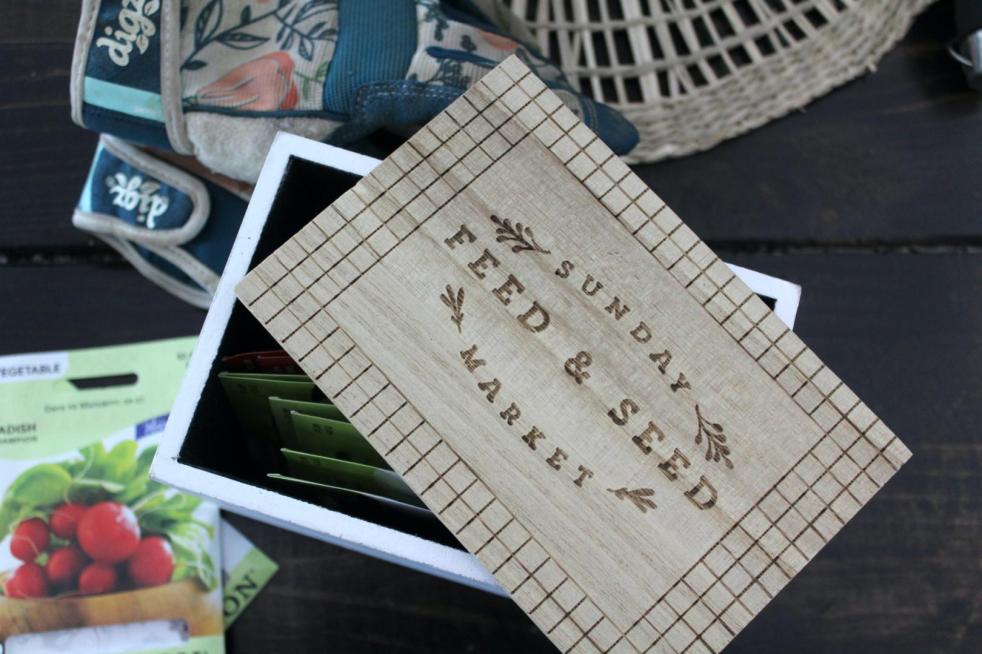 How to plan a garden for beginners: It all begins with packets of seeds, pictured in a seed box.