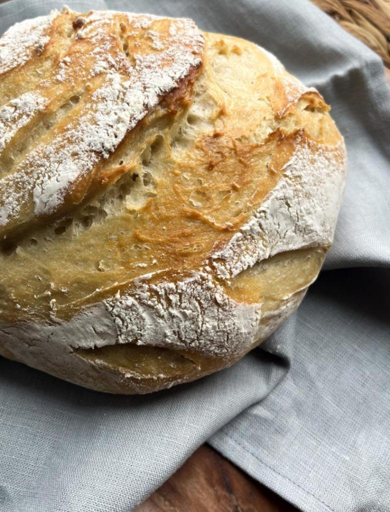 A beautiful design is shown on some freshly baked bread.