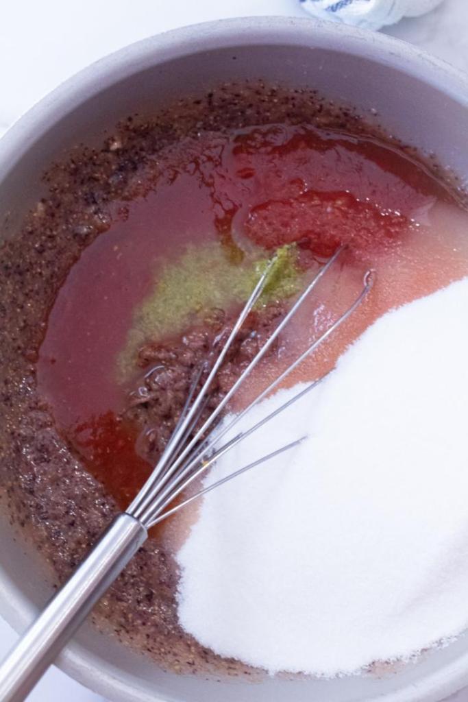 A fig mixture is combined with lime, sugar, and tomatoes.