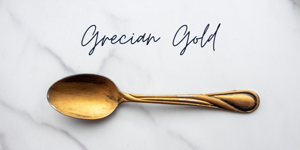 Grecian gold spoon is shown.