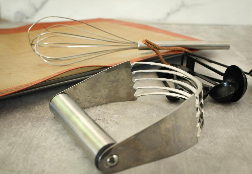 Several utensils are on a countertop before attempting a blueberry scones recipe.