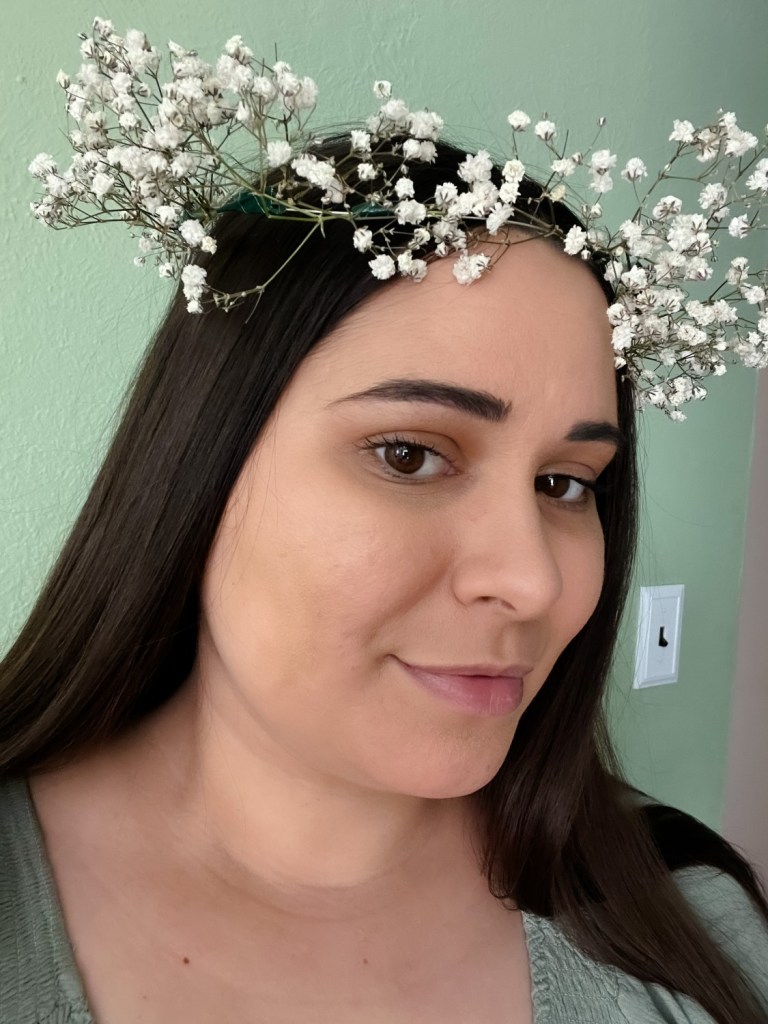 A mother sports her babies breath flower crown on her special blessingway ceremony day.