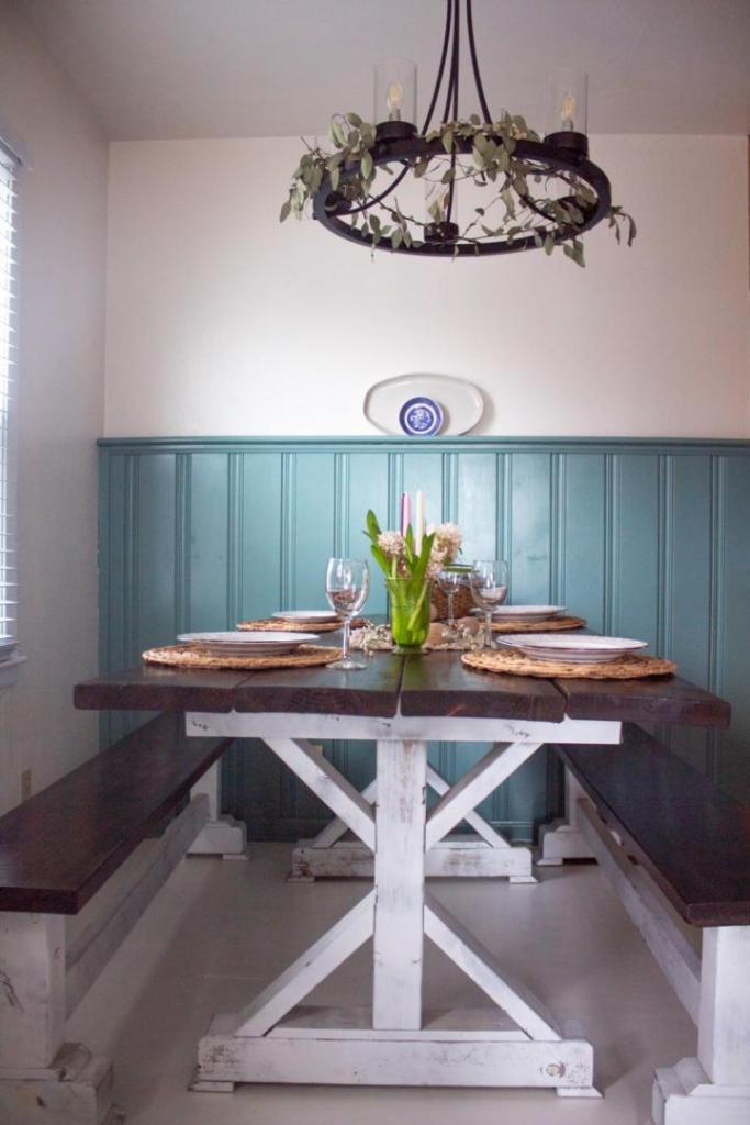 A spring Easter tablescape has eggs, candles, flowers, and more.