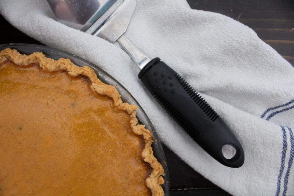 A perfect pumpkin pie is finished and ready to be devoured.