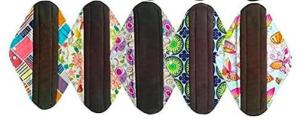 Reusable maternity pads are lined up in black and vibrant colors.
