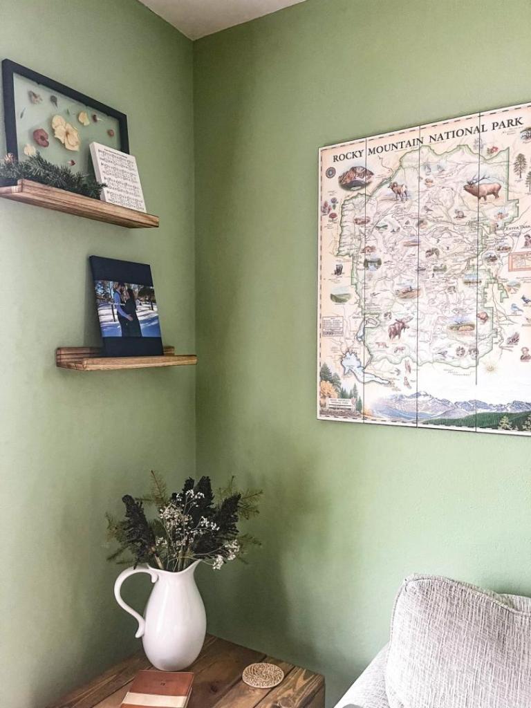 A corner holds ledges with photos on them.