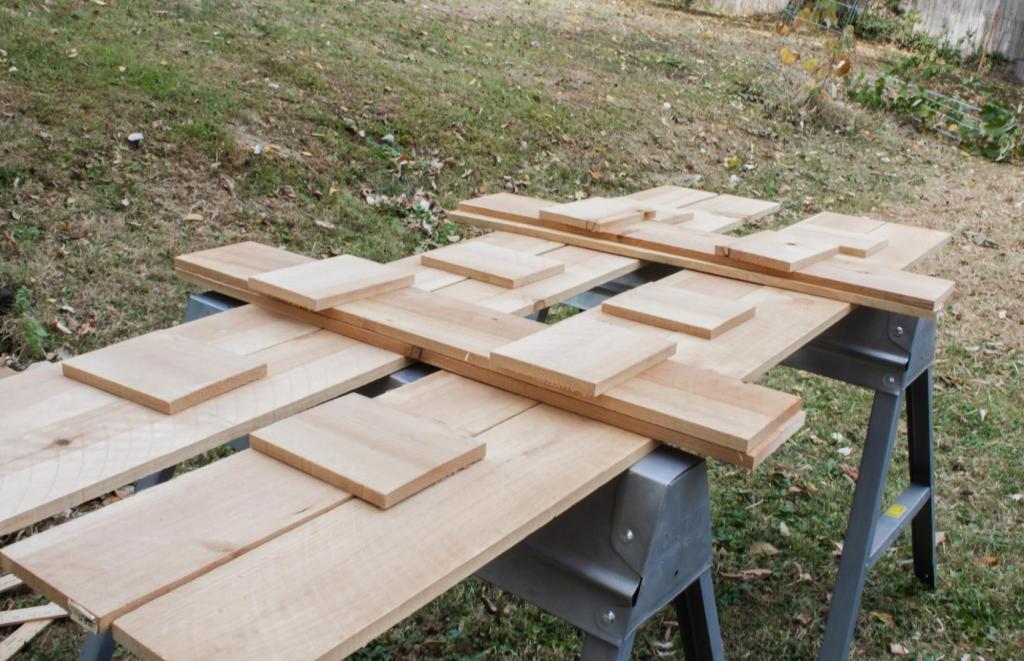 Long boards are lined up before attaching fasteners to them.