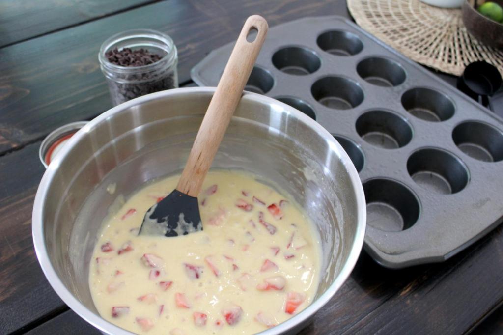 Strawberry muffin batter has been mixed up.