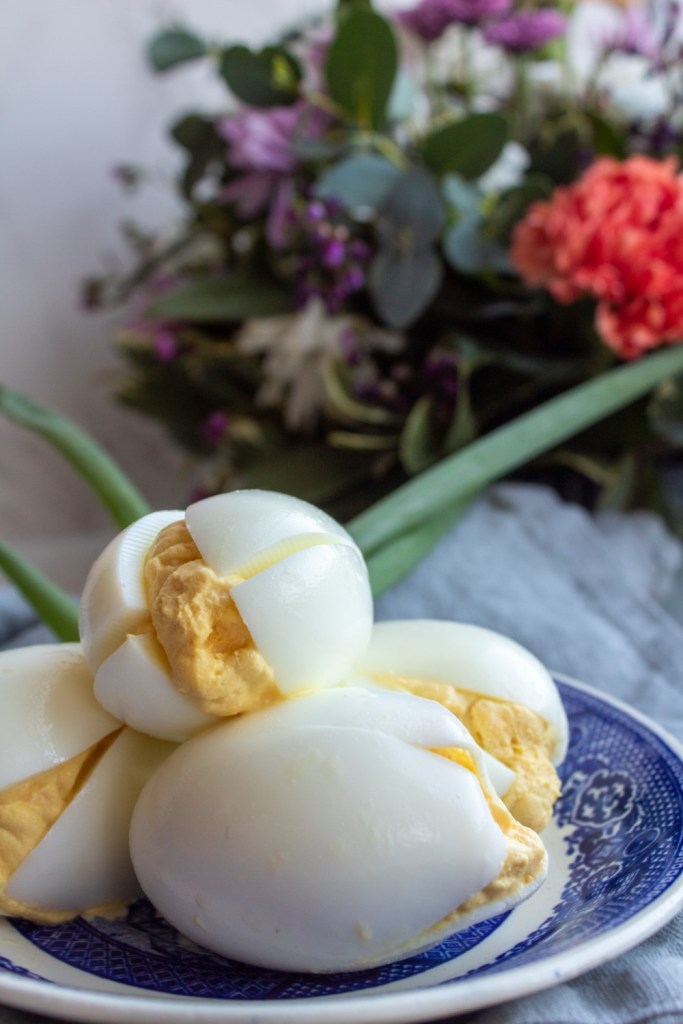 Deviled eggs are sliced to look like tulips.