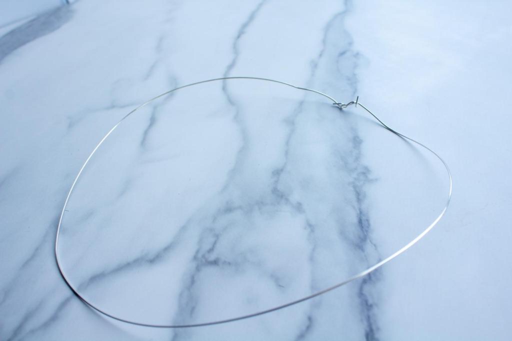 Wire is wrapped together after measuring it around the head.