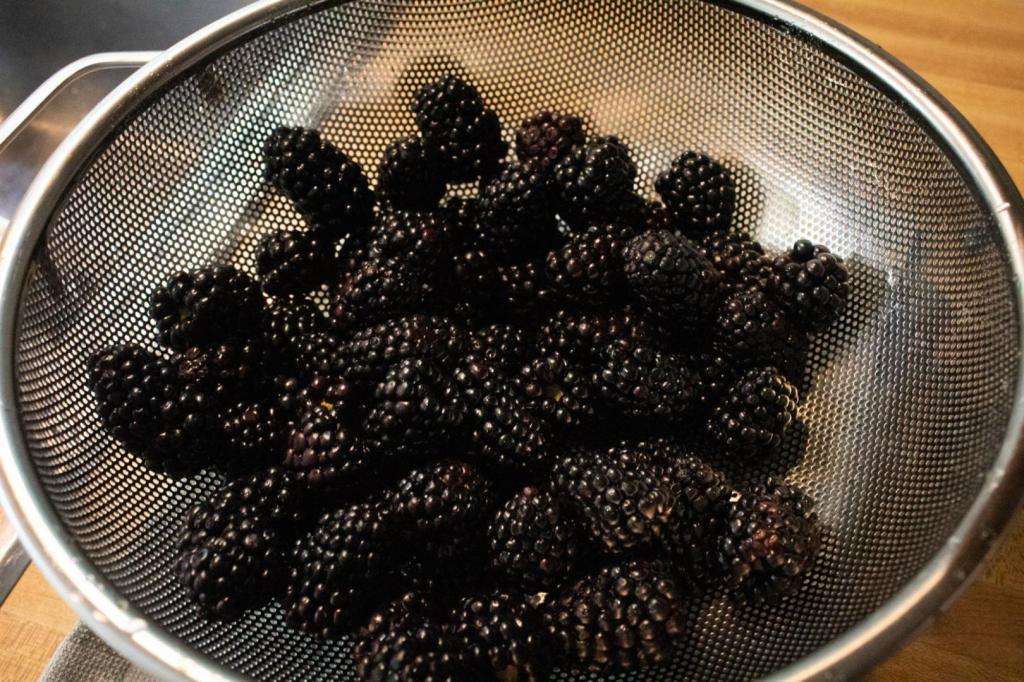 Blackberries have been rinsed before using in an easy blackberry cobbler recipe.