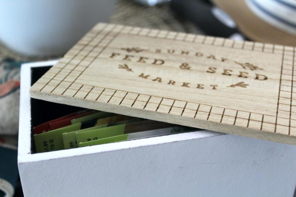 A seed packet box stores seeds for next season.