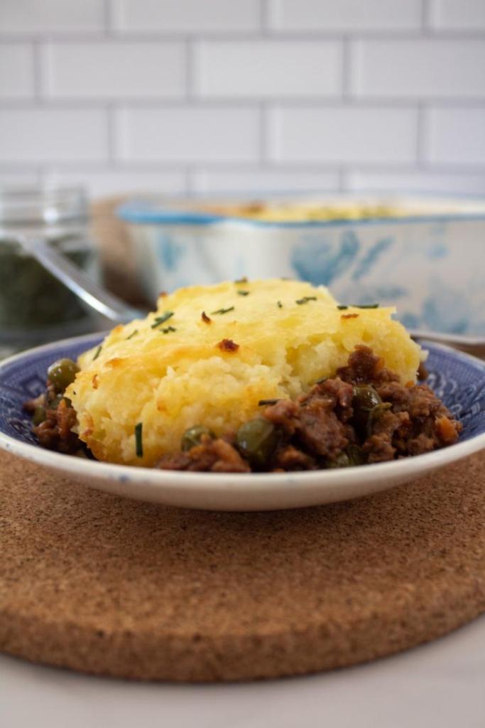 Impossible meat shepherd's pie is ready to eaten with a fork.