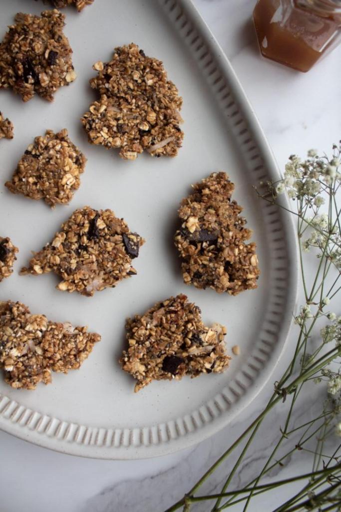 A granola bark recipe is broken into pieces before serving.