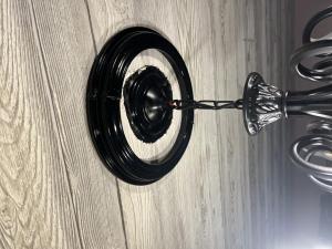 A chandelier has a frame added around it.