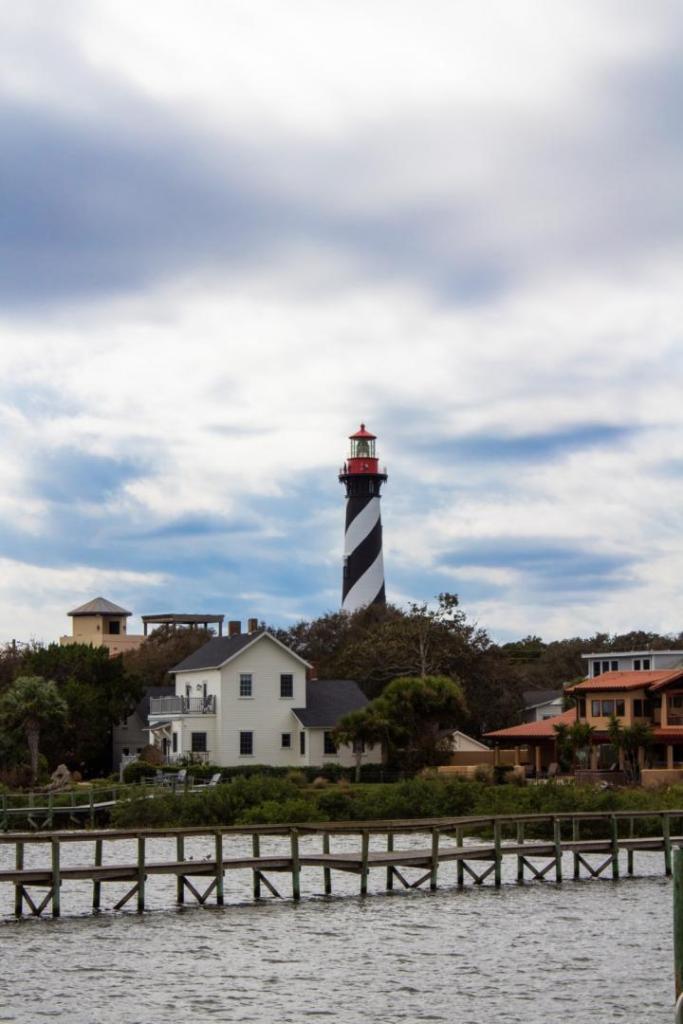 A lighthouse stands tall off the coast of scenic St. Augustine.