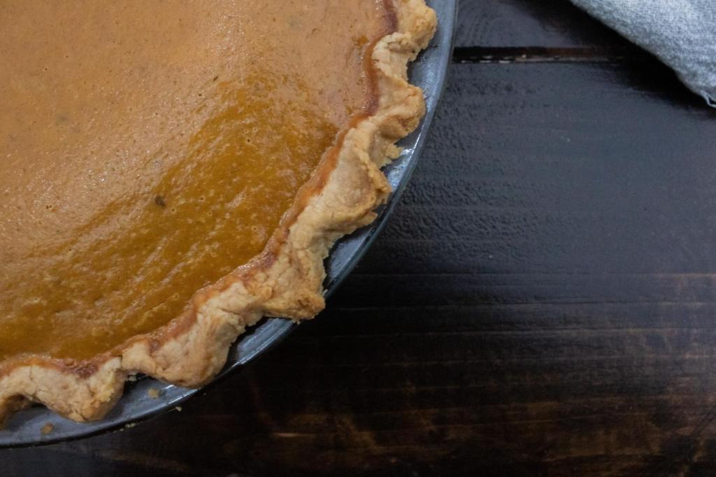 A pie crust is shown up close to describe the best pie crust tips.